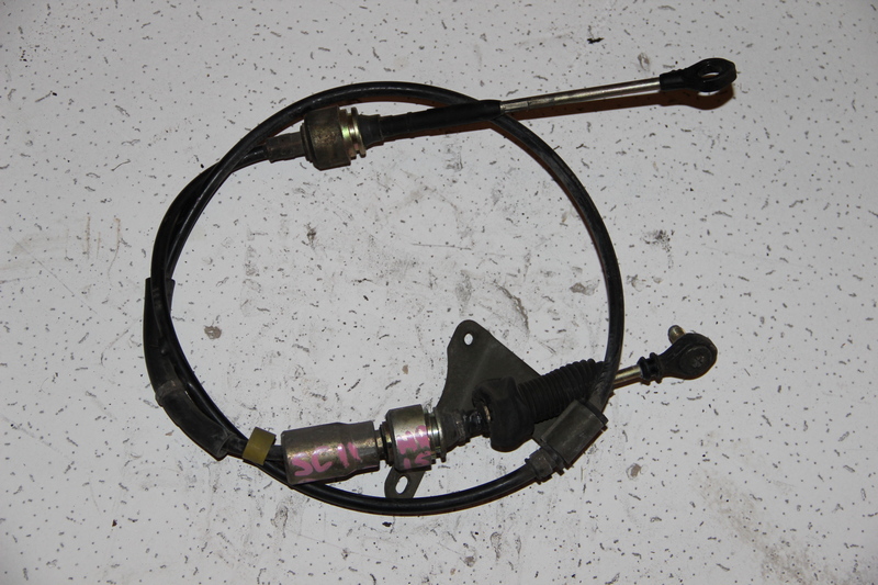 Трос коробки передач Nissan Tiida Latio SC11