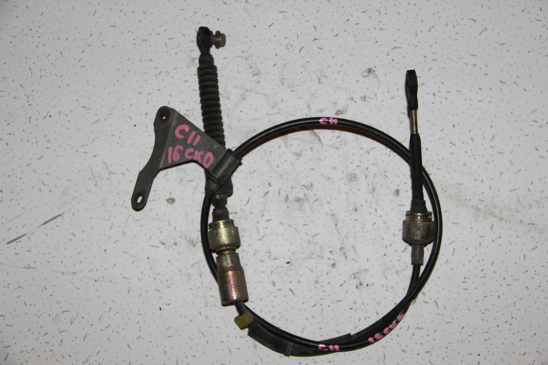 Трос коробки передач Nissan Tiida C11