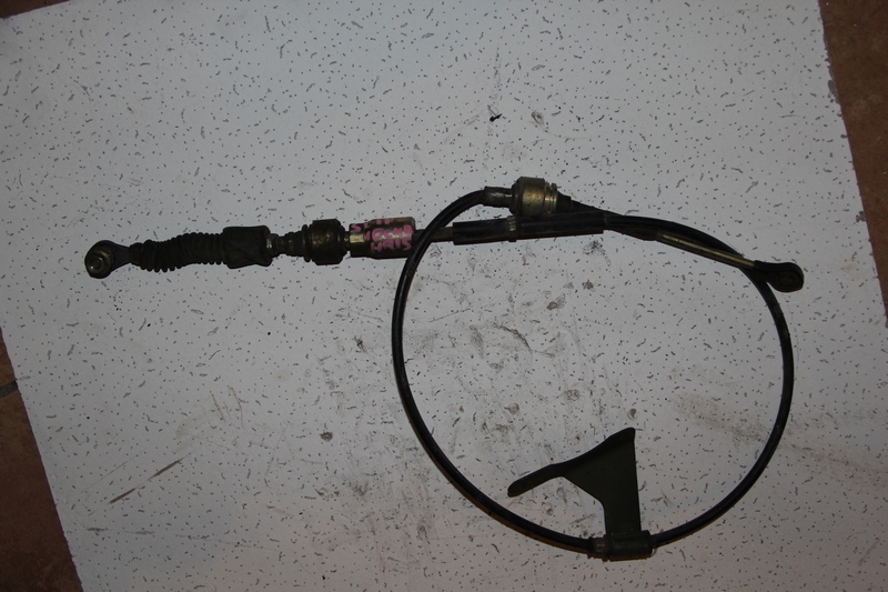 Трос коробки передач Nissan Tiida Latio SJC11