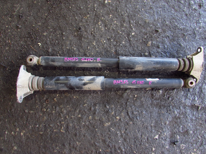 Амортизатор Mazda Axela