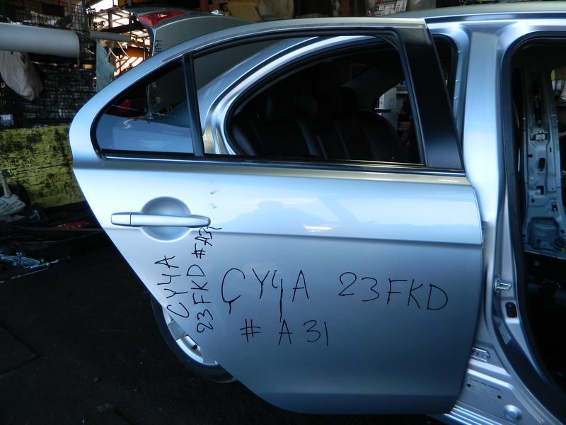 Дверь Mitsubishi Lancer