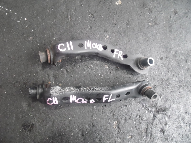 Рычаг Nissan Tiida